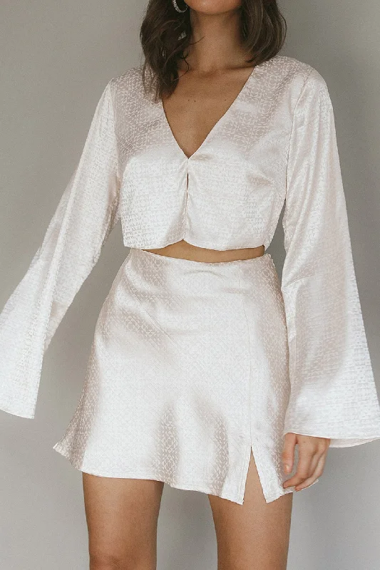 Ribbed Women Long Sleeve Top with a Textured AppealReese Long Sleeve Satin Crop Top Cream